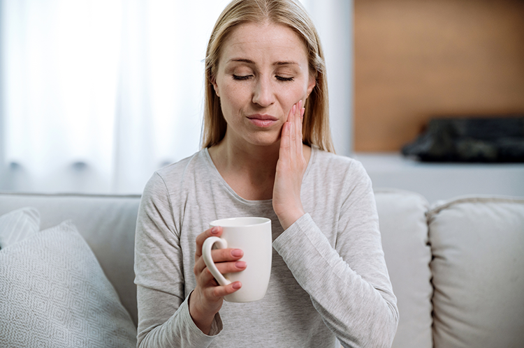 woman-coffee-jaw